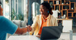 © FrameOn/peopleimages.com - Business people, handshake and meeting with laptop for hiring, thank you or recruiting in office. Human resources, woman and shaking hands with smile, technology and team onboarding in workplace