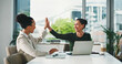 © peopleimages.com - Laptop, high five and business women in office for meeting, finance report and collaboration. Tech, celebration and financial advisors with investment proposal, achievement and deal in workplace