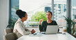© peopleimages.com - Laptop, meeting and business women in office with feedback on corporate performance review. Discussion, computer and female hr manager with employee for advice on career evaluation in workplace.