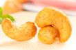 © TrieuBaoTran - Golden Roasted Vietnamese Cashew Nuts - Premium Salt-Baked Kernels with Amber Glaze