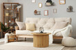 © Pixel-Shot - Interior of light living room with couch and coffee table
