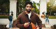 © peopleimages.com - Confident, man and student with portrait at college for education, scholarship and learning. Male person, ready and bag outdoor for study opportunity, course curriculum and knowledge at university