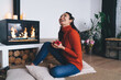 © BullRun - Young woman laughing joyfully with gift in hand, embodying emotional gratitude and personal connection in offline moments beyond digital communication.