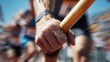 © Маргарита Вайс - close-up runners eagerly grip their relay batons, ready to sprint forward at local track event. sun shines brightly as excitement fills air, emphasizing competition and teamwork