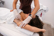 © PintoArt - Woman receiving professional armpit electrolysis hair removal treatment
