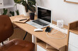 © Pixel-Shot - Workplace with gadgets and charger in office