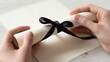 © Line - Black Ribbon Gift Wrapping Hand