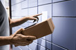 © terovesalainen - Delivery locker. Package and parcel post service. Courier office. Pick up or return product to mailbox. Man collect mail from smart postal automat with phone. Shipping scam.