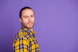 © deagreez - Young handsome guy wear checkered plaid shirt purple background showcasing casual fashion lifestyle style advertising branding use