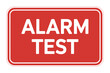 © Kalo - A red sign displays the words ALARM TEST in white lettering.