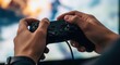 © Nataly - Hands on game controller during game playing, focus is on fingers holding controller for better control. Game playing provides relaxing time and immersive gaming experience.