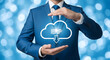 © Pixel Studio - Businessman presents erp cloud solution with hands in a blue suit on a bokeh background showcasing enterprise resource planning for business management and data integration services