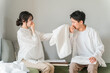 © buritora - Couples troubled by the smell of damp laundry, odor, drying laundry indoors