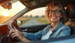 © Maryna - Happy mature woman drives car on open road at sunset. Wears stylish glasses, smiles brightly. Older lady enjoys independent journey, feeling freedom. Joyful female driver travels during golden hour.