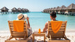 © Jari.art - Relaxing beach scene with two people enjoying drinks on lounge chairs, overlooking calm turquoise water and thatched roof bungalows
