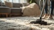© Ilmi - Modern Apartment Living: Housekeeper Vacuuming Rug in a Cozy Space with Soft Textures and Warm Lighting