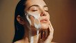 © Nestudio - Close-up of gentle cleansing foam on womans cheek or chin, capturing soft creamy texture against a smooth, minimal background, representing fresh skincare and daily cleansing.