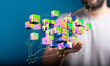 © vegefox.com - Abstract image showing a hand reaching for digital cubes symbolizing data transfer, technology, and connectivit