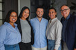 © Sabrina - Multi generational business people smiling in front of camera inside modern office - Multiracial colleagues, success and teamwork concept