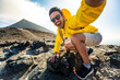 © Davide Angelini - Happy hiker having fun hiking mountains - Active young man taking selfie pic with smart mobile phone device outdoors - Action cam, extreme sports and summertime holidays concept