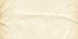 © md - Vintage crumpled paper texture background with aged and folded details, beige