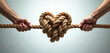 © Viktor - Two hands pull a thick rope forming a heart shape. This visual represents relationship struggles and emotional tug of war. It symbolizes conflicts within love, marriage, or partnerships.
