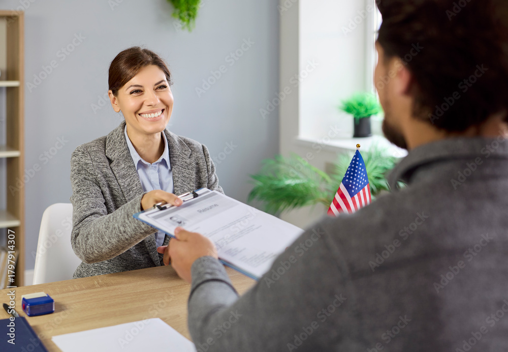 Consulate interview and approval of work visa documents in office with ...