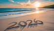 © Macrostock - Message Year 2025 replaced by 2026 text written on beach sand background. Good bye 2025 - 2026 happy New Year coming concept. top view.