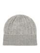 © CREATIVE KNIT DESIGN - Warm knitted winter cap on a plain white backdrop for woman