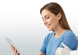 © Meow Creations - Smiling woman patient reviewing medical data on a tablet during doctor consultation