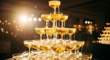 Sparkling champagne tower creates an elegant and festive celebration centerpiece.