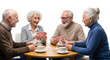 © Vladislav - Elderly caucasian group playing cards and enjoying coffee together