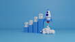 © Nuchjaree - 2026 Growthing graph bar with rocket rising moving up. Start up business development to success and growing growth concept. Abstract rocket launch and graph growing up. Success strategy. 3d rendering