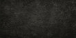 © Faysal - Dark gray vintage textured paper backdrop with black grunge surface and rough concrete wall pattern