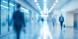 © Jana - Blurred Business People Walking in Modern Hallway