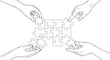 © Ali - Hands assembling a jigsaw puzzle pieces symbolizes teamwork and collaboration concept
