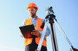 © Serhii - Surveyor man marking land with theodolite equipment