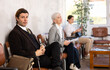 © JackF - Adult man in business suit is waiting on chair in office space