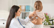 © Pixel-Shot - Pediatrician examining little girl in clinic