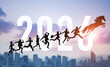 © metamorworks - 2026年へジャンプする馬と人々　2026年午年新年イメージ　ビジネス向け年賀状素材