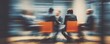 © Audrey - Abstract motion blur of professionals engaged in a strategic business discussion. High quality