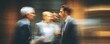 © Audrey - Abstract motion blur of professionals engaged in a strategic business discussion. High quality