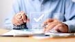 © Smile Studio AP - Businessman stamping approved documents with digital checkmark interface. Concept of verification, validation, authorization, electronic document approval, and business compliance.