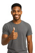 © Juan - Smiling man giving thumbs up with confident positive cheerful attitude