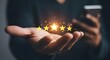 © MSTJOYTERA - Customer satisfaction and excellent service represented by glowing stars held in a hand with a smartphone in the background