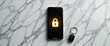 © Vladimir - Smartphone displaying lock symbol on marble table for Data Privacy Day