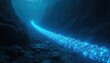 © miss irine - Glowing blue fiber optic cable lies on dark rocky seabed. Underwater cable connects distant locations on ocean floor. Cable emits light in deep blue water between rocks.