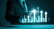 © si9nzation - Businessman interacts with holographic upward arrow chart showing business growth and success on futuristic interface