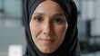 © Yuliia - Female portrait close-up arabian smiling cute Muslim business woman in hijab businesswoman muslim islamic girl worker smile looking at camera in office workplace beautiful face positive ethnic lady