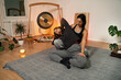 © phoenix021 - Thai yoga massage, woman masseuse  performing stretches that helps muscles loosen up